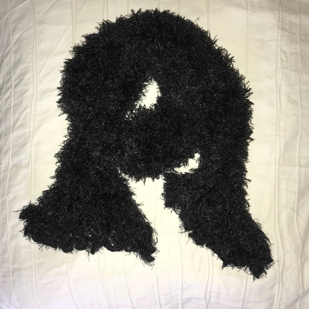 Fluffy soft scarf for a cozy warm days.