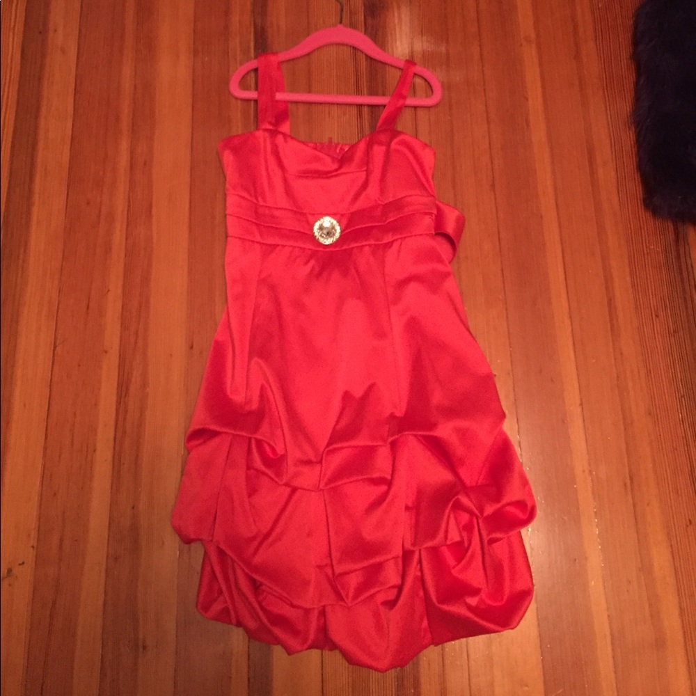 A gently used red kids dress
