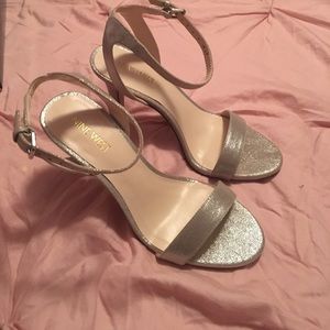 Nine West Size 7 silver glittery strap of heels.