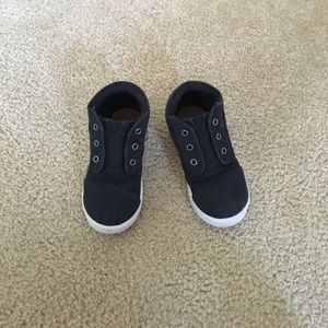 Black Toms mid top shoes