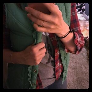 Lightly worn green Billabong puffy vest