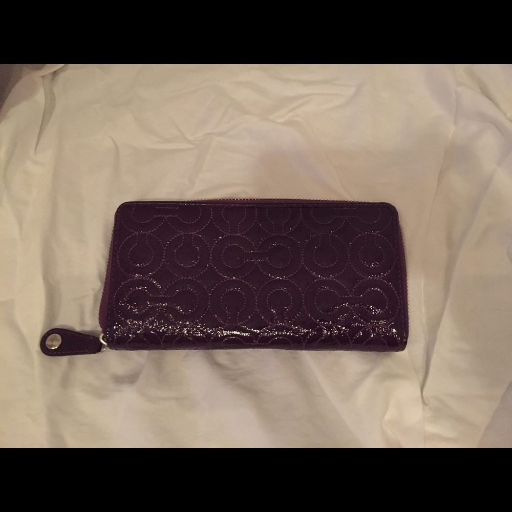 Purple Coach patent leather wallet