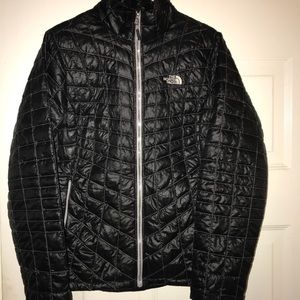 The North Face black women’s puffy jacket