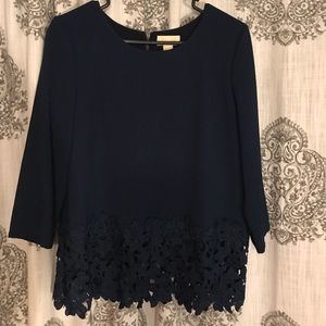 Navy appliqué bottom lace detail dressy blouse.