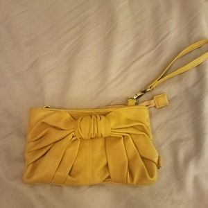 Mustard yellow bow clutch purse bag