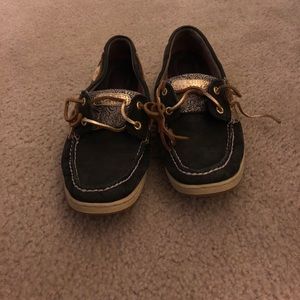 Navy and gold sperrys