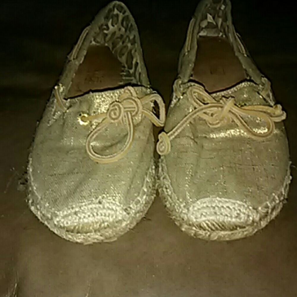 Women's Sperry gold slip ons