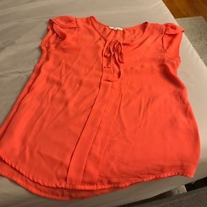 Salmon colored top