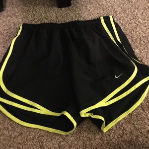 Black Nike running shorts
