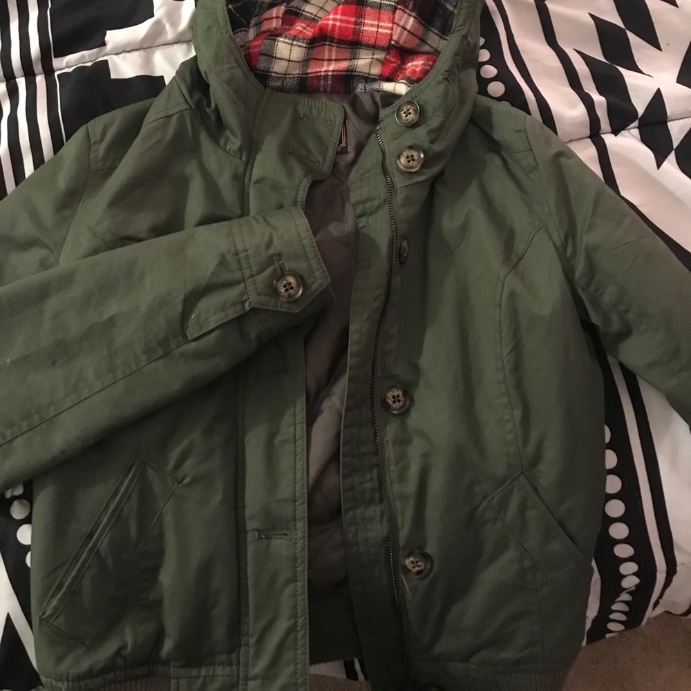 Olive green jacket.