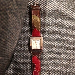 Coach watch silver with suede band.