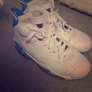 White and blue Jordan's