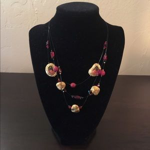 Gold and red necklace