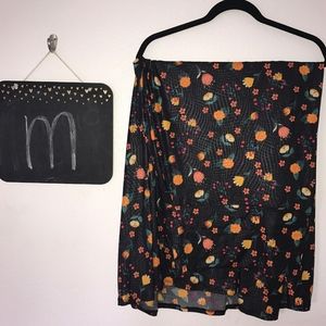 LuLaRoe Maxi Skirt. Black, leathery print. Flowers