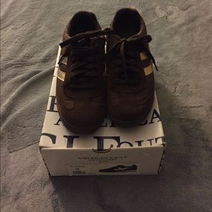 Brown and gold sneakers