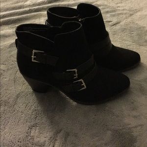 Black ankle booties with faux leather detail