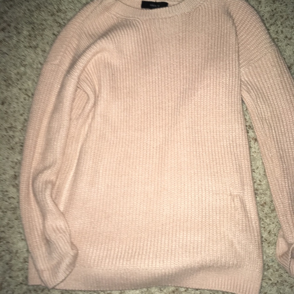Pink knitted sweater