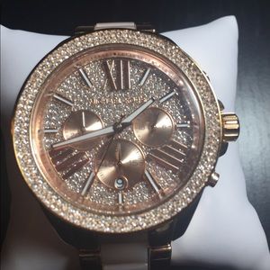 A beautiful rose gold watch by MK.