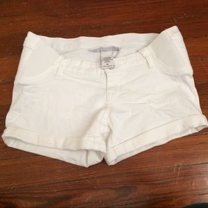 White denim maternity shorts.