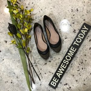 Lands End flat shoes with gold detail.