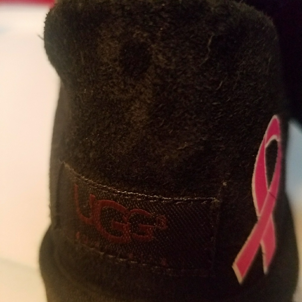 Boots. Breast Cancer Awareness Logo.