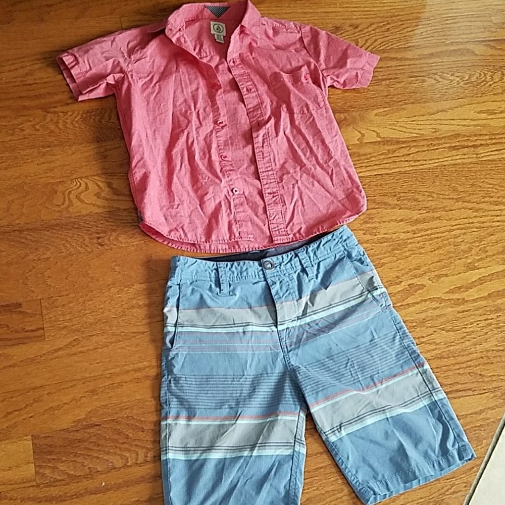 A set of Volcom shorts and button up shirt