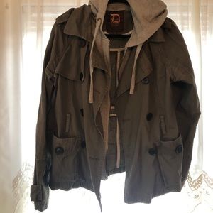 Hunter green utility jacket — grey hooded lining.