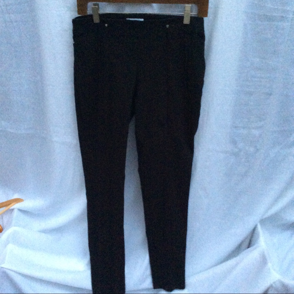 N worn Calvin Klein dress pants.