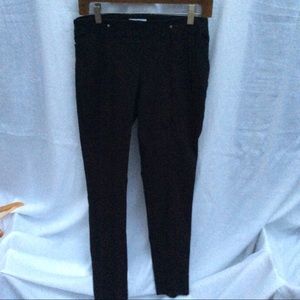 N worn Calvin Klein dress pants.