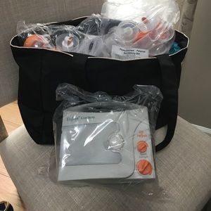 BRAND NEW Hygeia Enjoye Breast Pump and diaper bag