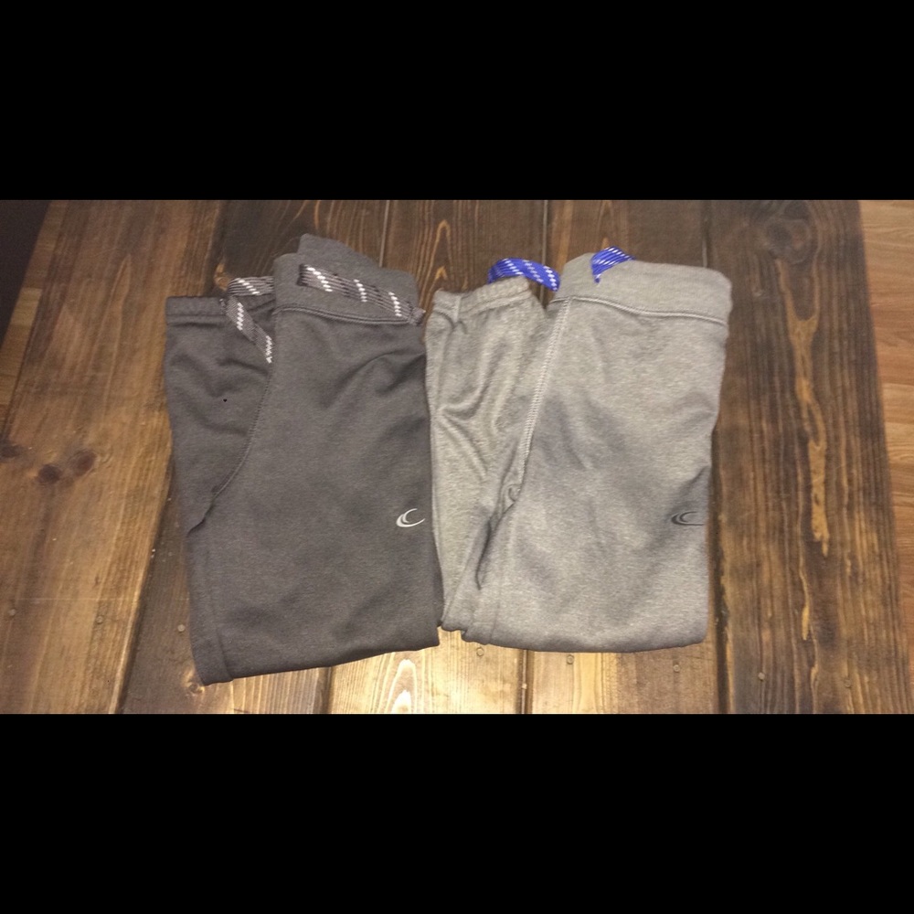 2 pairs of gray swratpants