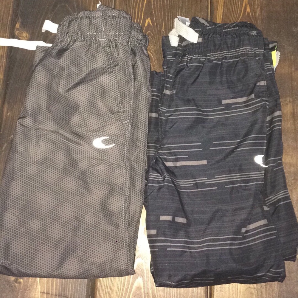 2 pairs of Windbreaker pants