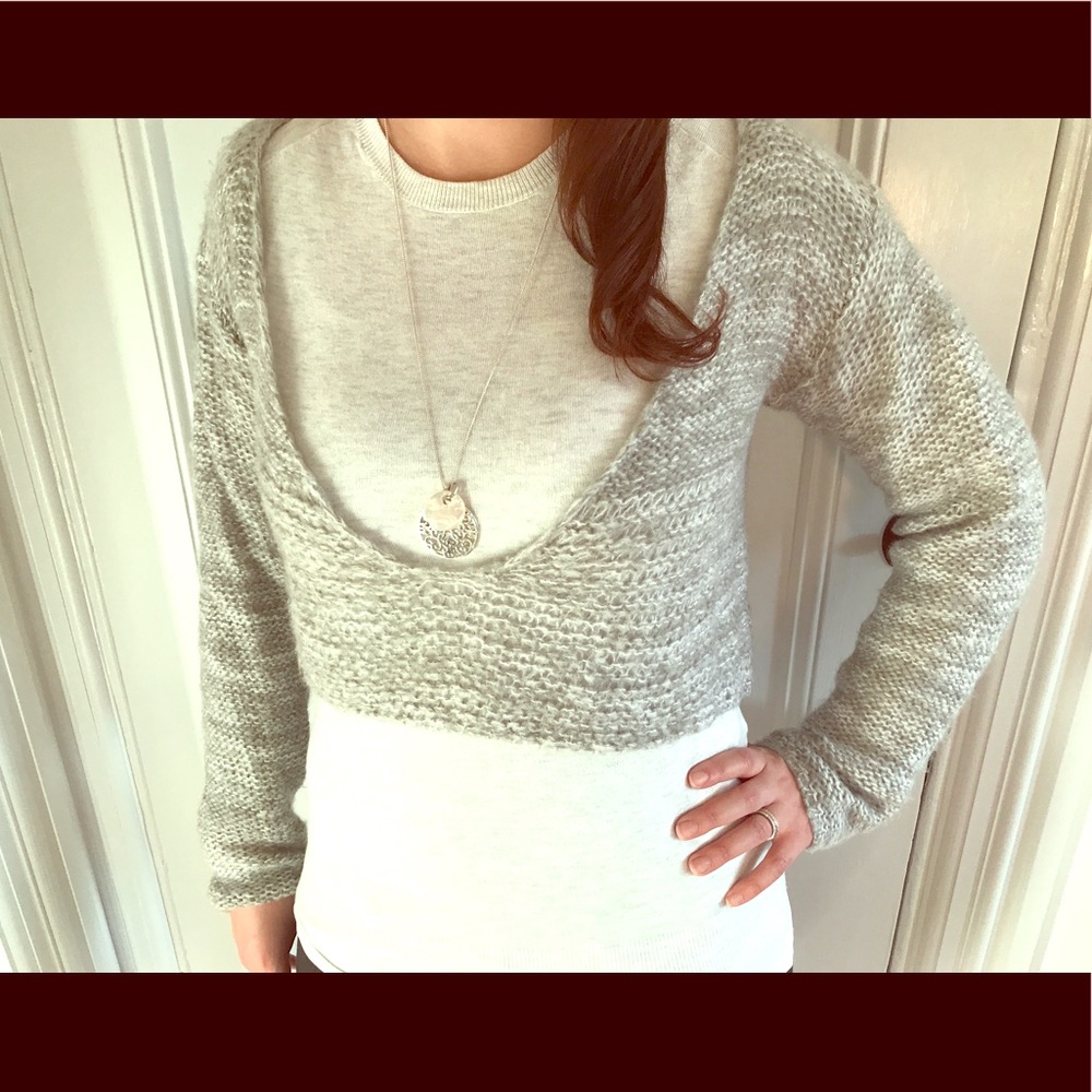 Light grey knitted sweater designed in Germany