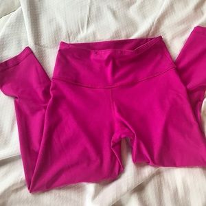 Bright pink high-waisted workout capris