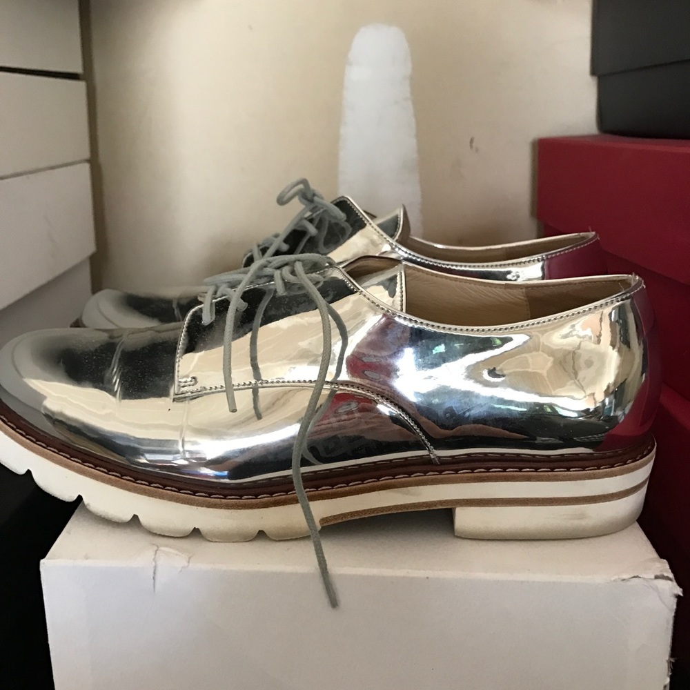 A sliver Stuart weitzman shoe