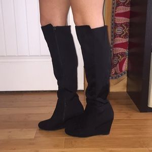 Over the knee wedge boots