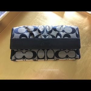 Black and grey Coach wallet