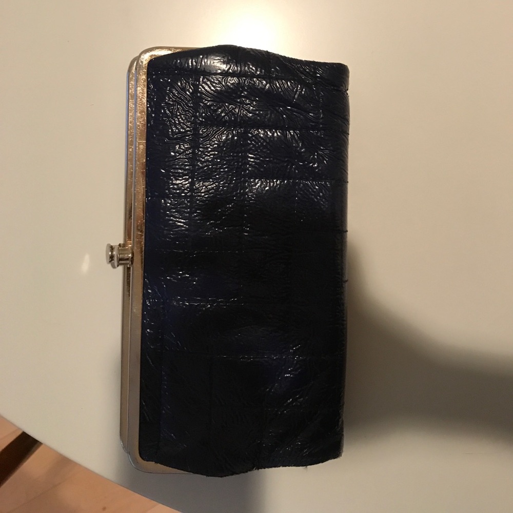Royal blue Hobo wallet with gold hardware.