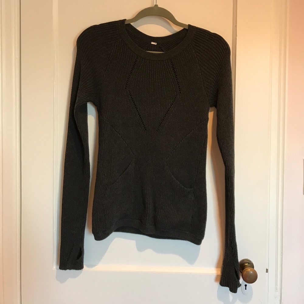 Lululemon dark gray sweater with thumb cutouts.