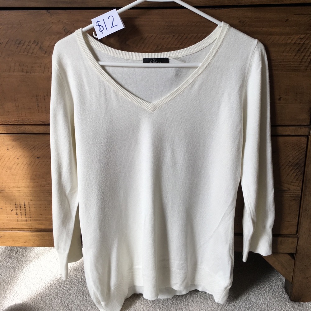 White V-neck sweater