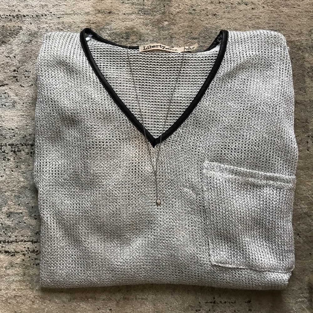 Leather lined neck. Oversized sweater