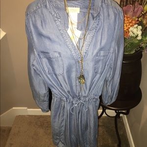 Chambray romper with pockets. NWT.