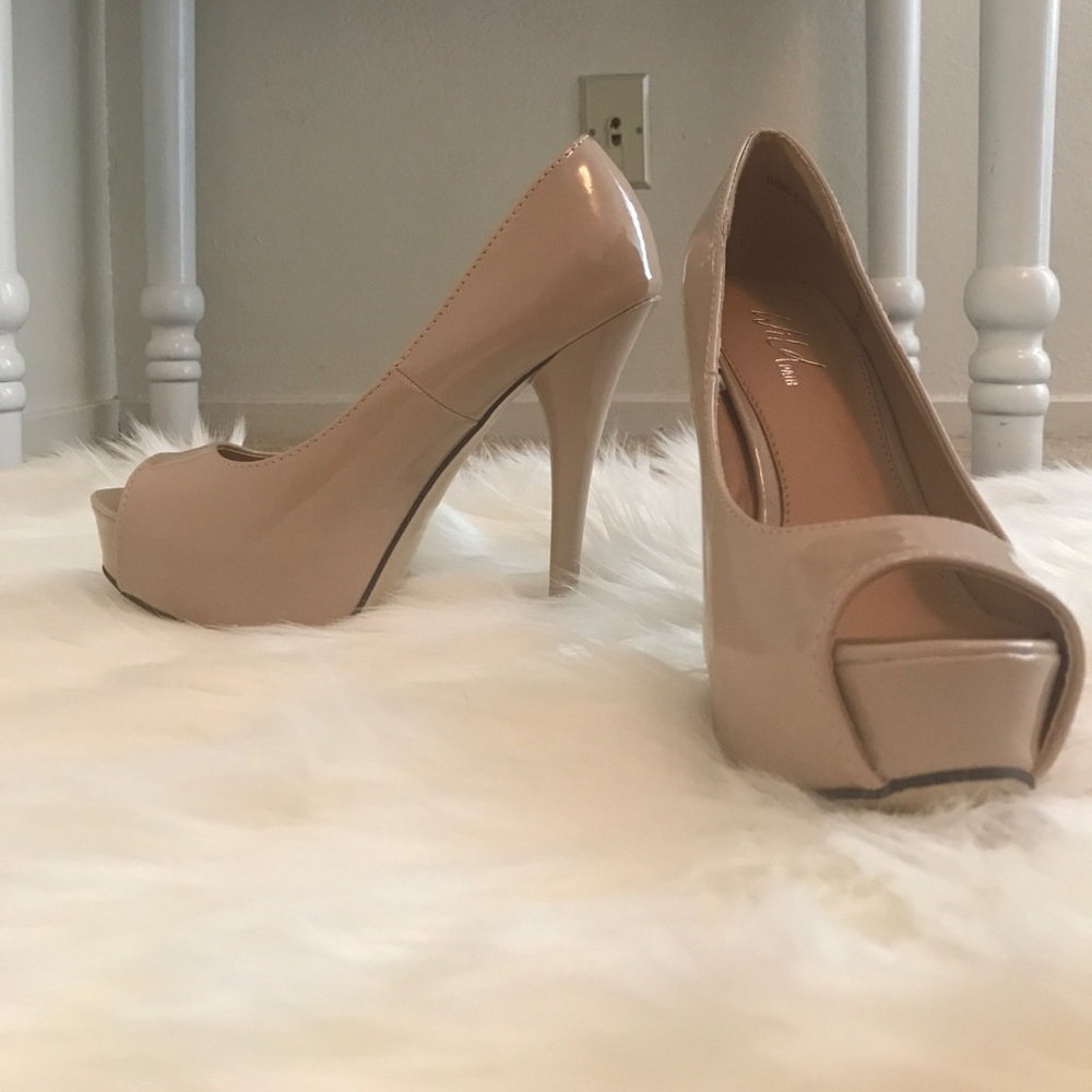Beige open toe pumps