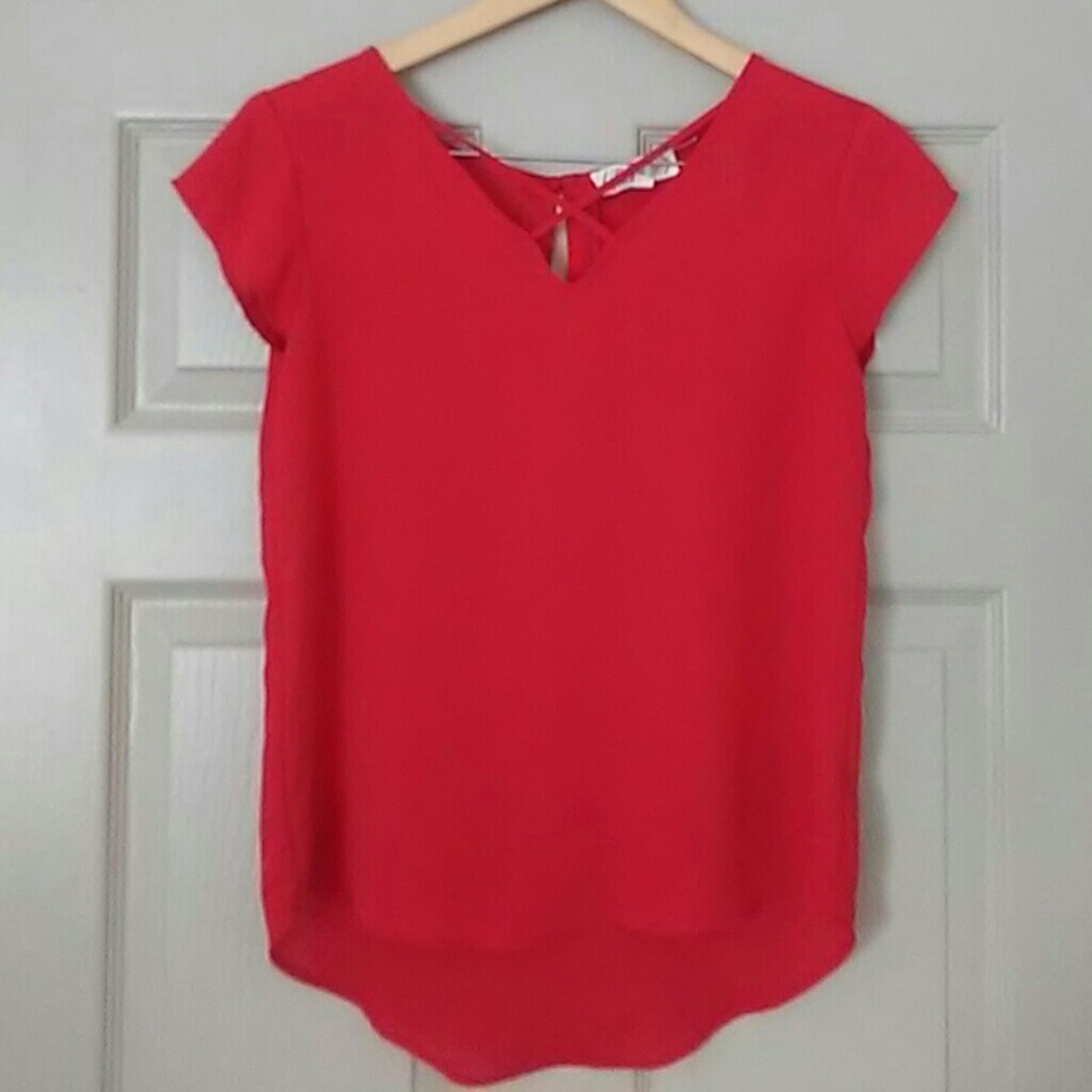 Red short sleeve blouse.