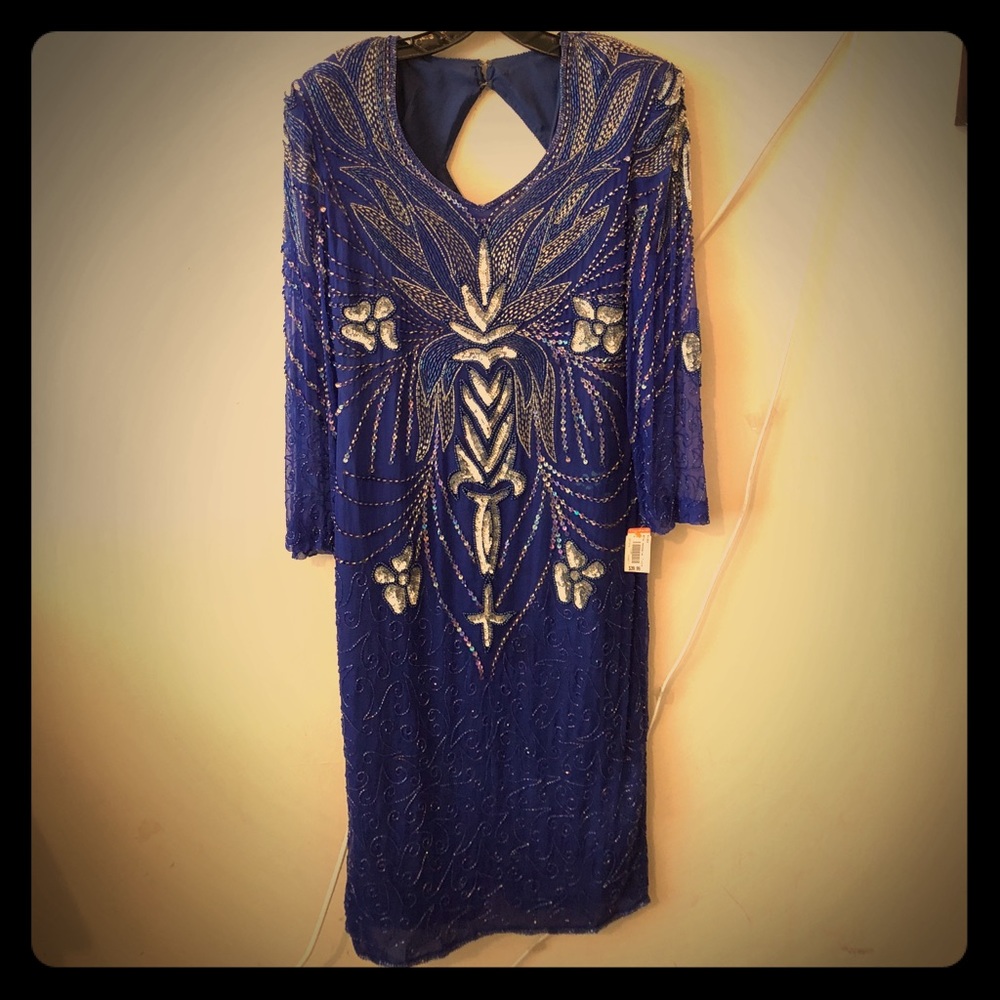 A vintage inspired navy blue sequined dress.