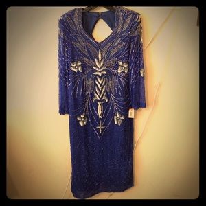A vintage inspired navy blue sequined dress.