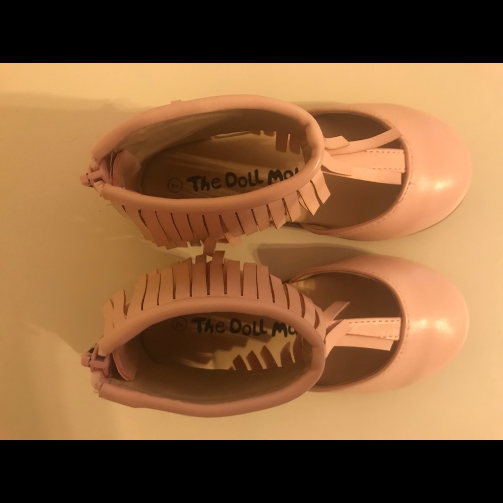 Pink fringe shoes