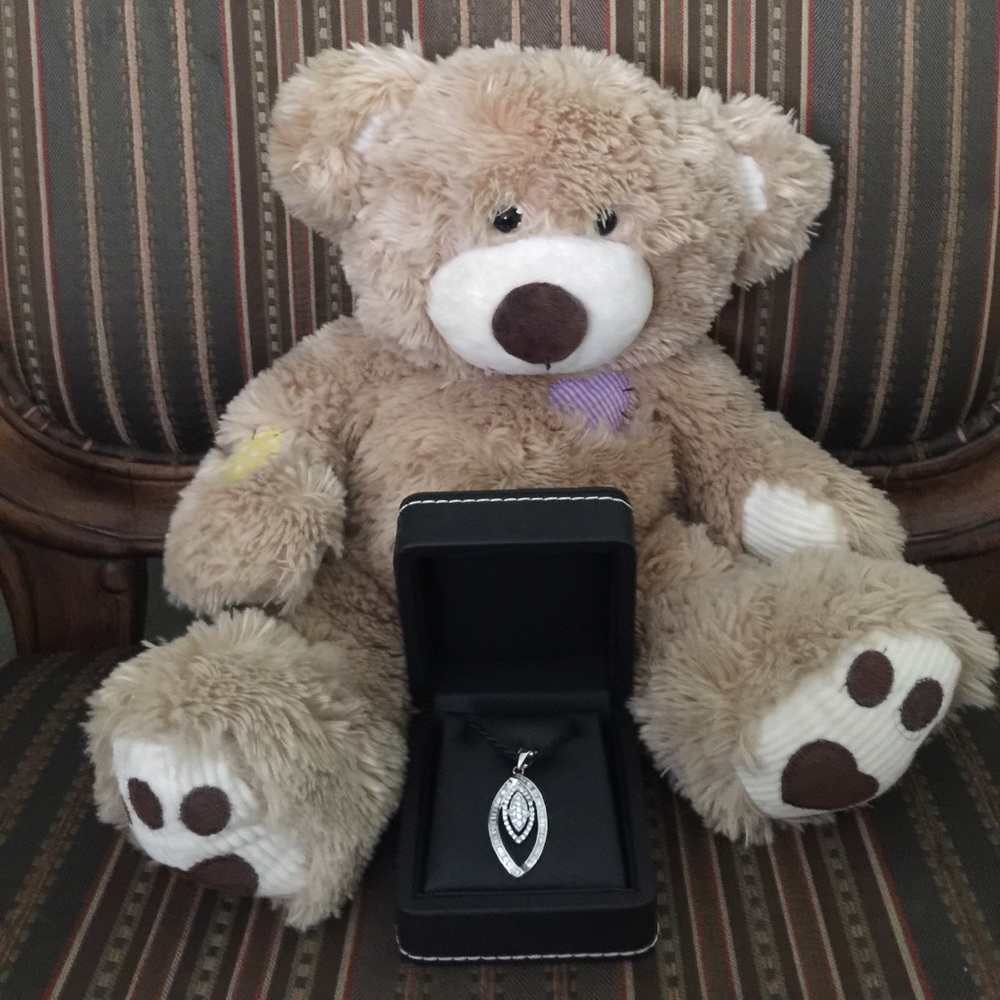Silver Diamond pendant with box.