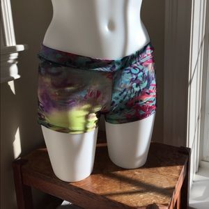 Onzie sport short. One size. Cool tropical colors.