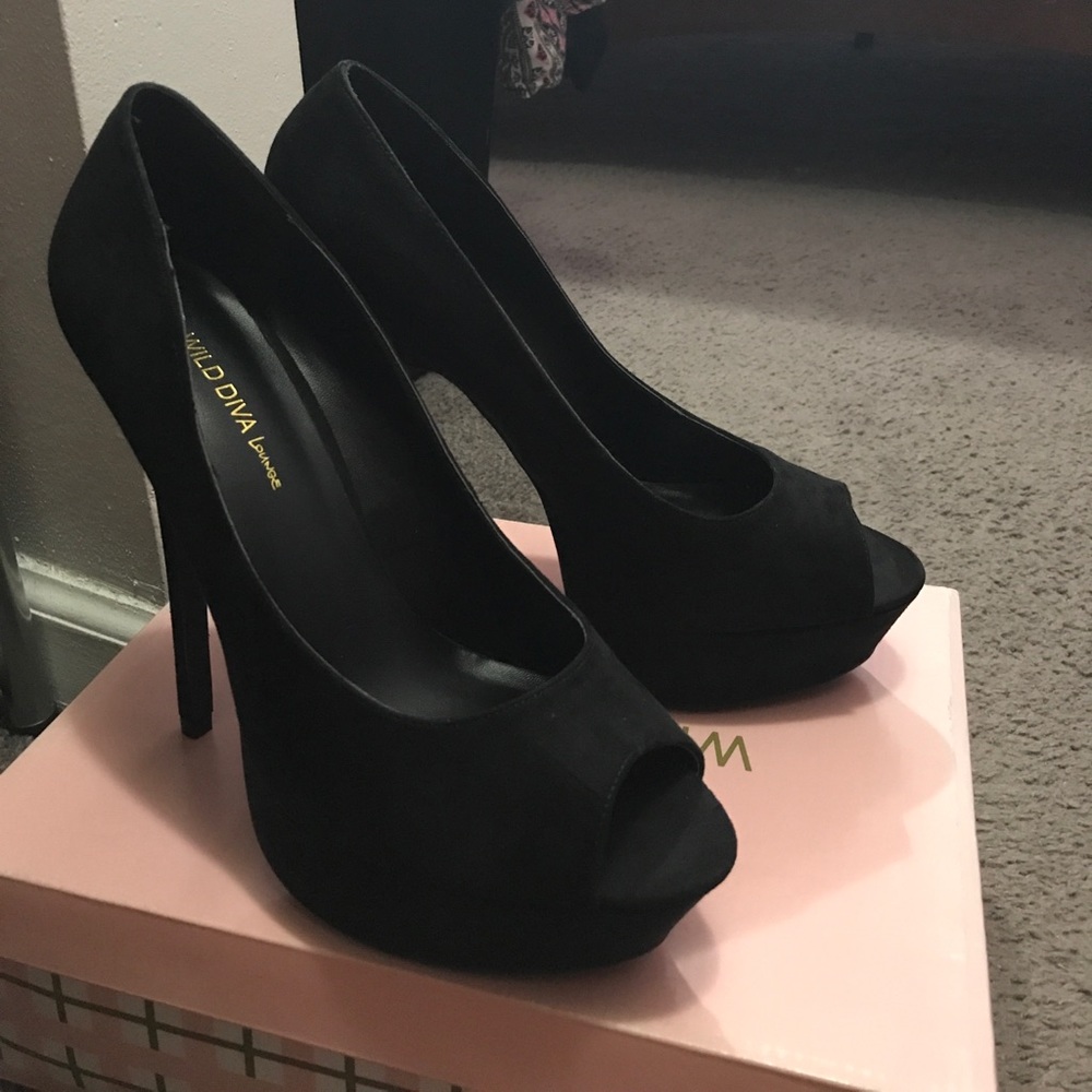 Black suede pumps
